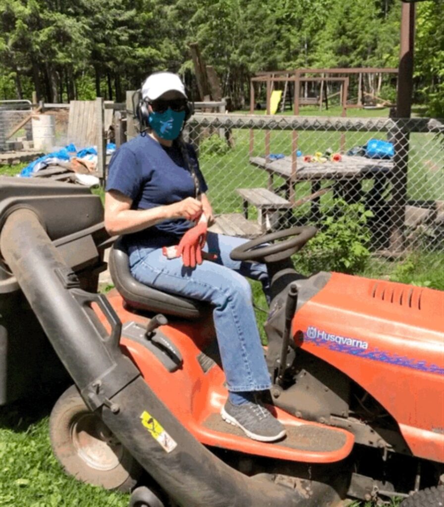 Kathy on lawn tractor - Invisible Work - Gleanings From the Word.com