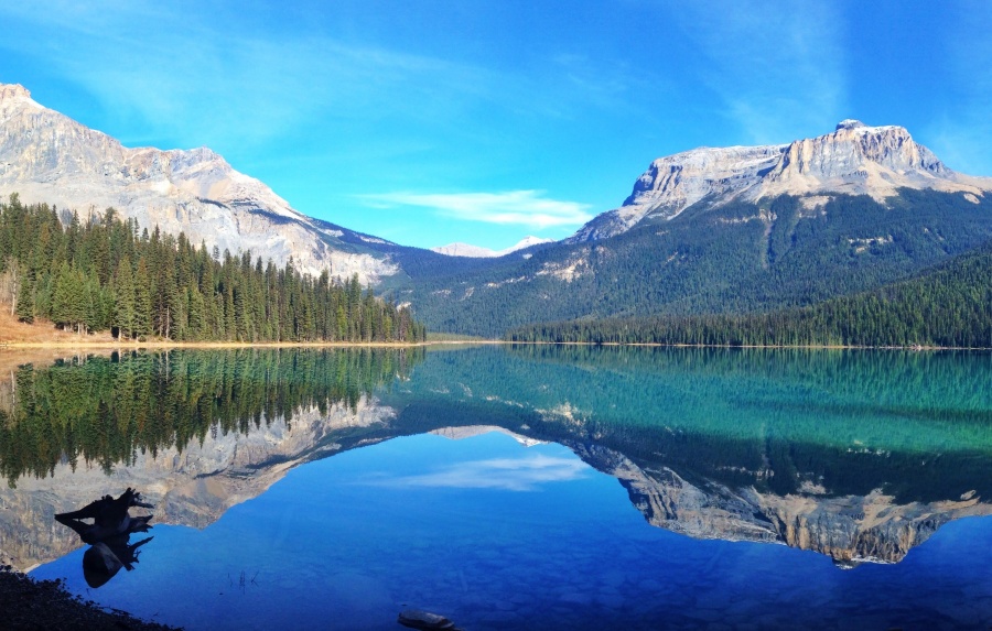 Emerald Lake reflecting nearby mountains - Gleanings From the Word