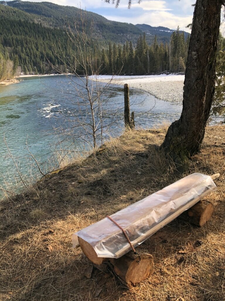 Wooden bench overlooking the confluence of Clearwater and Notth Thompson Rivers, Clearwater, BC
