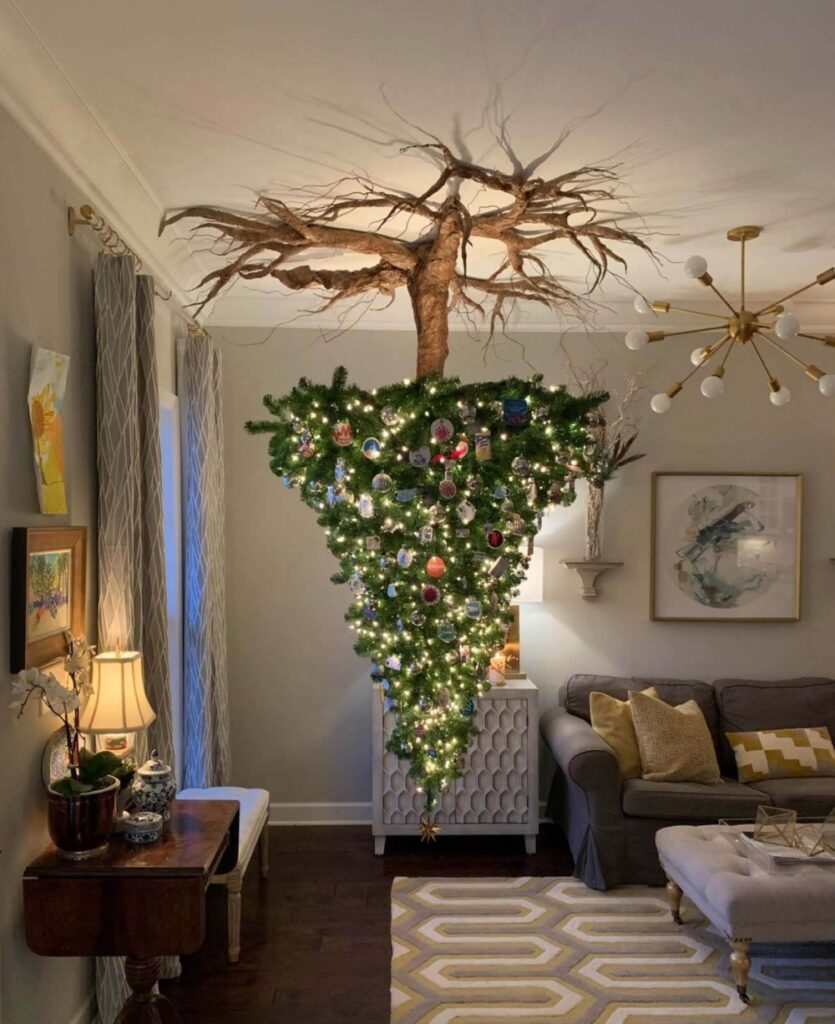 Fully decorated Christmas tree mounted upside down on ceiling